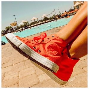 High top Converse Chuck Taylor shoes